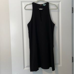 Black Karlie dress with gold bar neckline